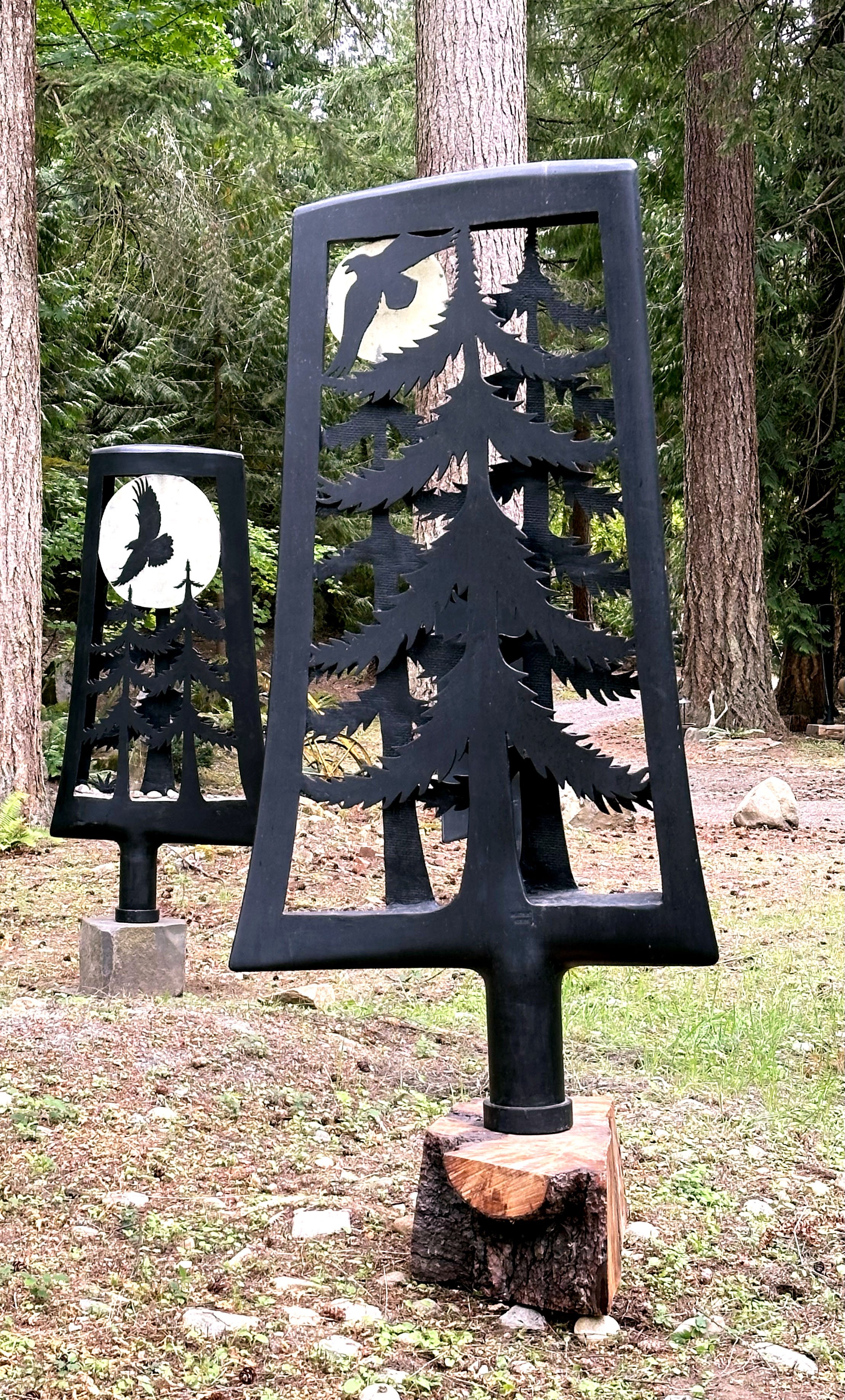 Breathe Deep and Breathe Deep Raven Moon sculptures