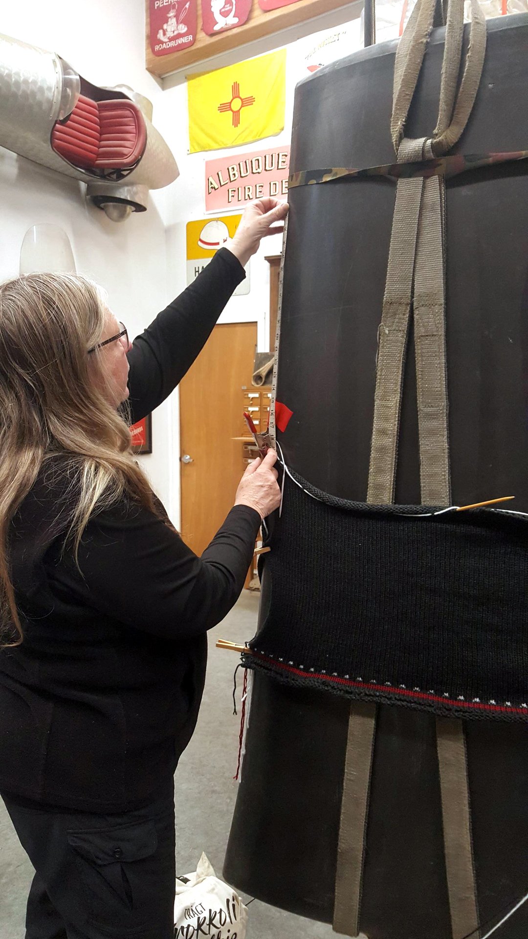 Esther Reiquam fitting a knit sweater on blade