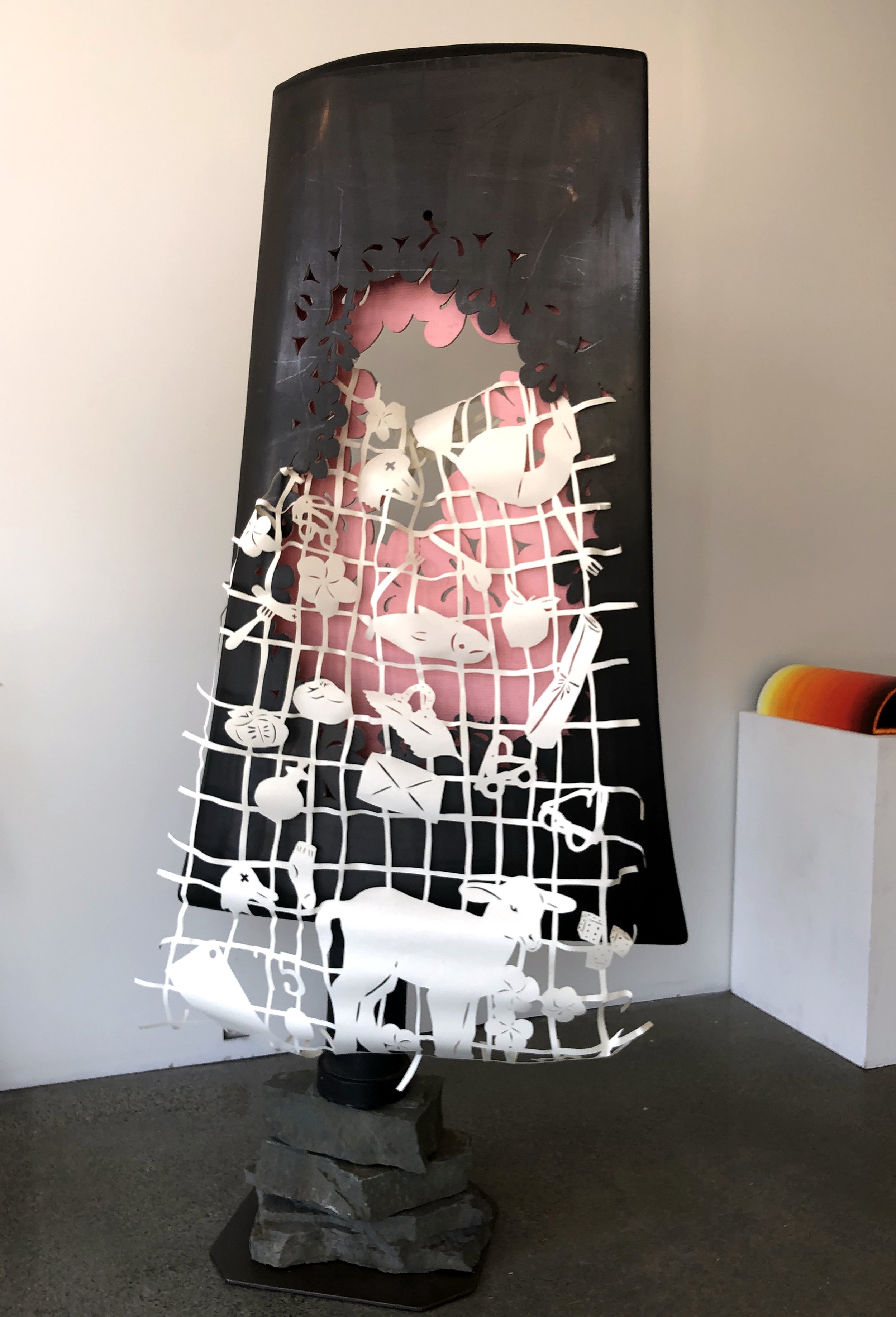 The Birth of Memory by Lauren Iida — reclaimed nuclear fan blade and cut paper
